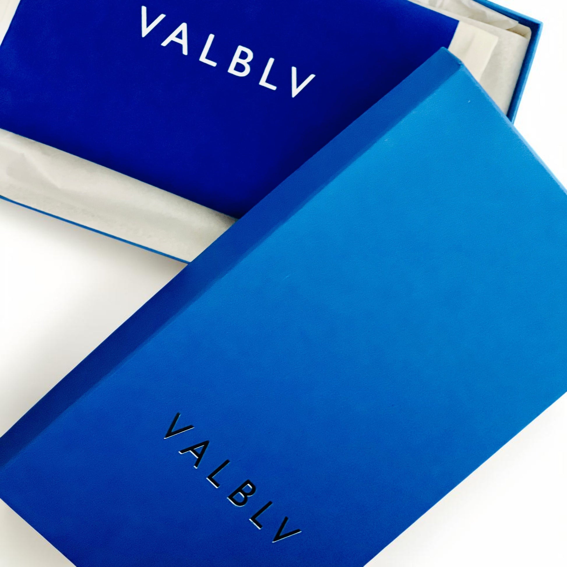 V A L B L V branded blue shoe box and dust bag for luxury Italian footwear
