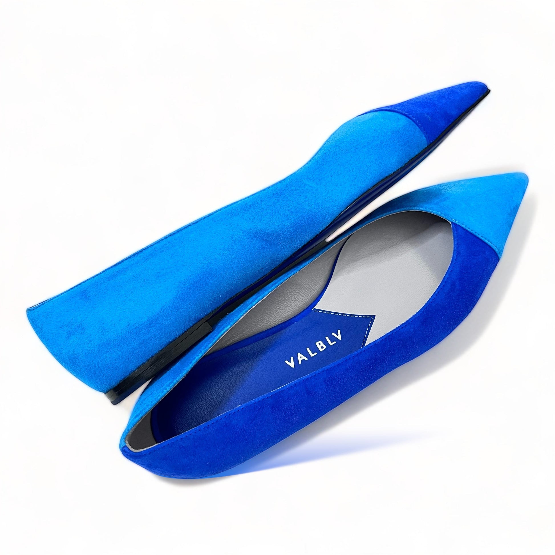 V A L B L V pointed toe ballerina flats in sea and sky blue suede with a modern, artistic two-tone design.