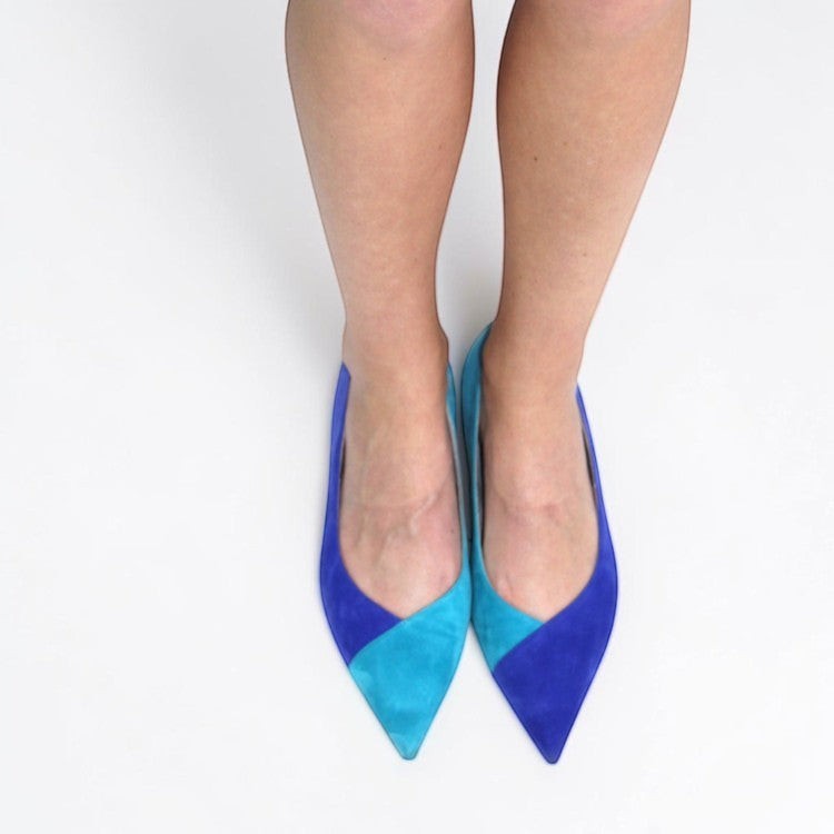 V A L B L V pointed toe ballerina flats in two-tone sea and sky blue suede worn on feet against a white background.