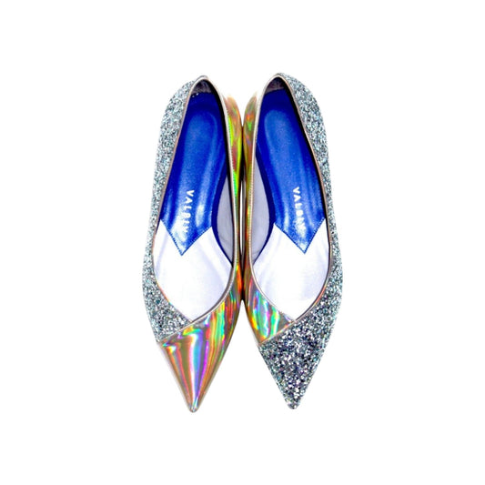 V A L B L V pointed toe ballerina flats in silver glitter and reflective stardust patent leather with blue insoles.