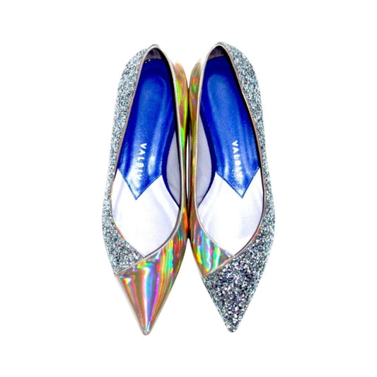 V A L B L V pointed toe ballerina flats in silver glitter and reflective stardust patent leather with blue insoles.