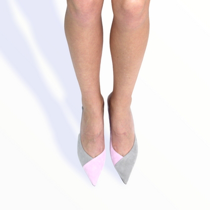 Pastel pink and gray pointed-toe shoes on a white background